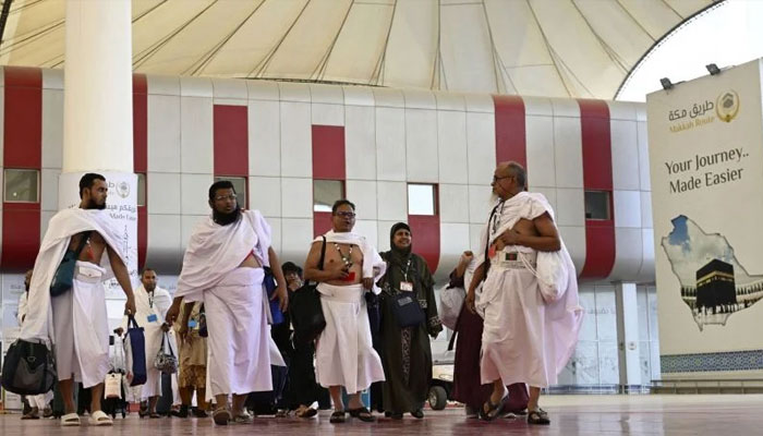 Pilgrims arrive at King Abdul Aziz International Airport in Jeddah, ahead of the Haj pilgrimage in Mecca, on May 10, 2024. — AFP