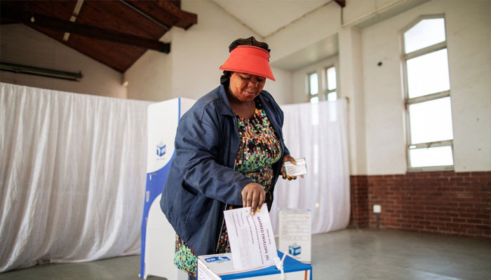 A voter casts her ballot during the special votes at the Glebe Community Hall voting station in Umlazi on May 28, 2024. — AFP