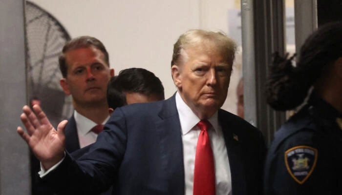 Former US President Donald Trump returns after a break in his criminal trial for allegedly covering up hush money payments at Manhattan Criminal Court on May 28, 2024 in New York City. — AFP