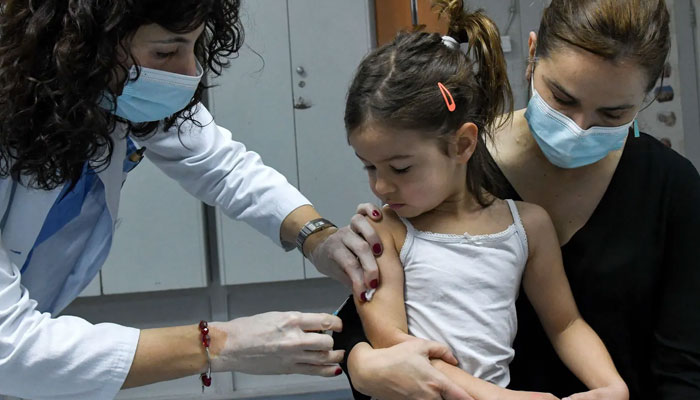 A representational image showing a health worker administers a measles vaccine in a hospital of Montenegros capital Podgorica. — AFP/File