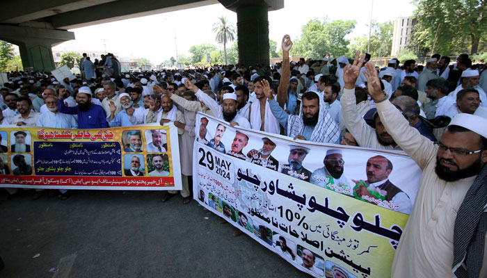 Members of the All Government Employees Grand Alliance hold a protest demonstration for acceptance of their demands, outside the KP Assembly building in Peshawar on May 29, 2024. — PPI