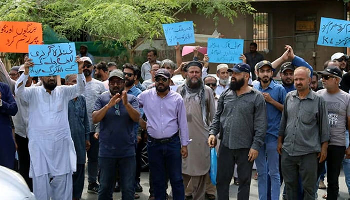 Karachiites hold a protest against prolonged electricity loadshedding and overbilling in Karachi, on May 20, 2024. — PPI