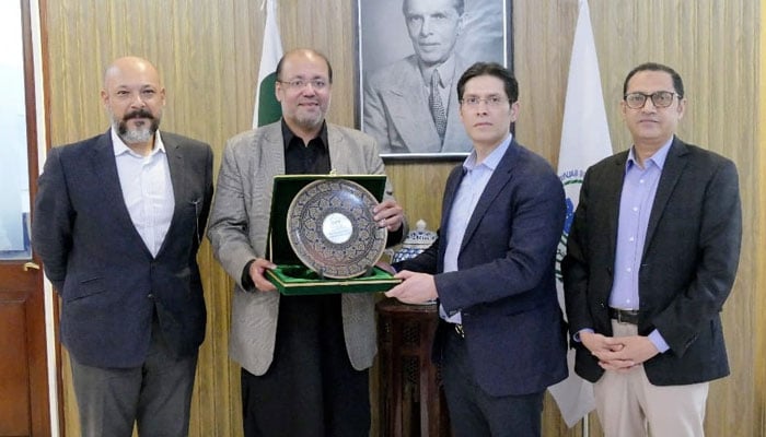 Minister for Industries and Commerce Chaudhry Shafay Hussain presents a souvenir shield to Vice Consul General of Ghana Omar Shahid Butt in this image on May 30, 2024. — Facebook/Chaudhry Shafay Hussain