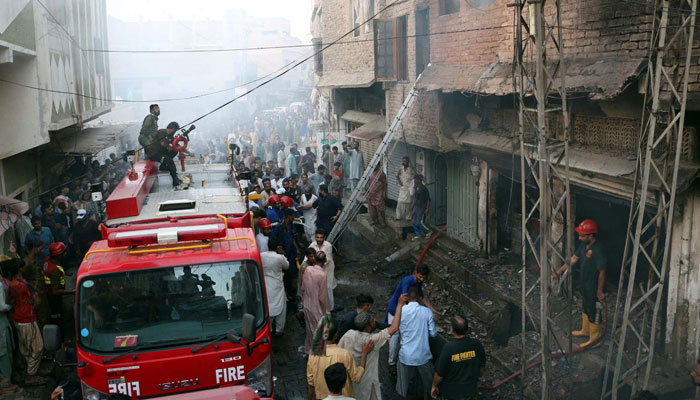 Fire brigade officials extinguish a fire at the Paretabad area in Hyderabad on May 30, 2024.  —PPI