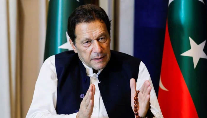 Former prime minister and PTI founder Imran Khan gestures as he speaks with Reuters during an interview, in Lahore on March 17, 2023. — Reuters