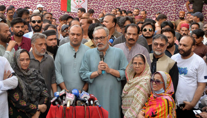 Muttahida Qaumi Movement (MQM-P) senior leader Haider Abbas Rizvi pictured alongside Sindh Assembly Opposition Leader Ali Khurshidi speaks to the media during a press conference in Hyderabad on June 1, 2024. — PPI