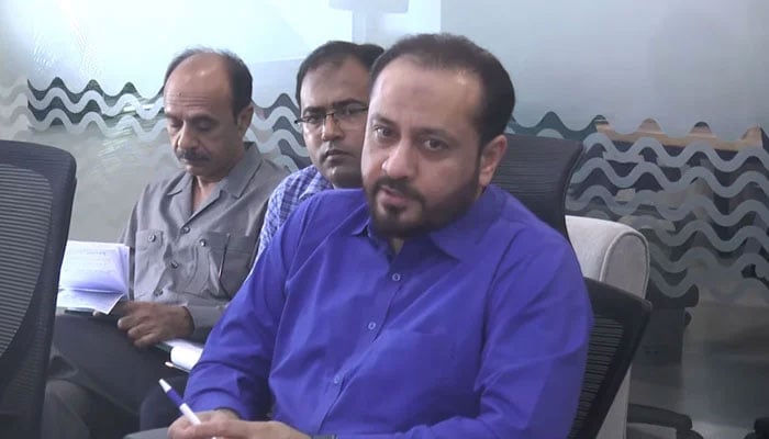 Punjab Minister for Primary and Secondary Healthcare Khawaja Imran Nazir gestures while chairing a meeting in this video released on April 4, 2024. — Screengrab via Facebook/Primary & Secondary Healthcare Department