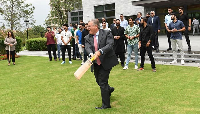 US Ambassador Donald Blome enjoying cricket with Pakistan team players at US Embassy in this image released on April 30, 2024. — X/@usembislamabad