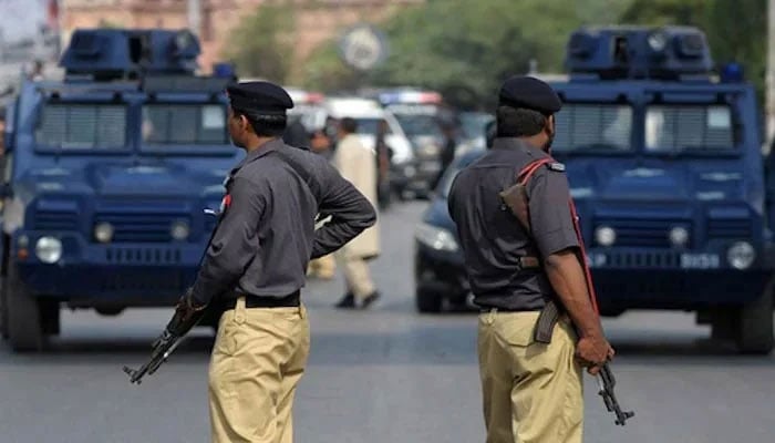 A representational image showing two policemen standing guard at an undisclosed location. — AFP/File