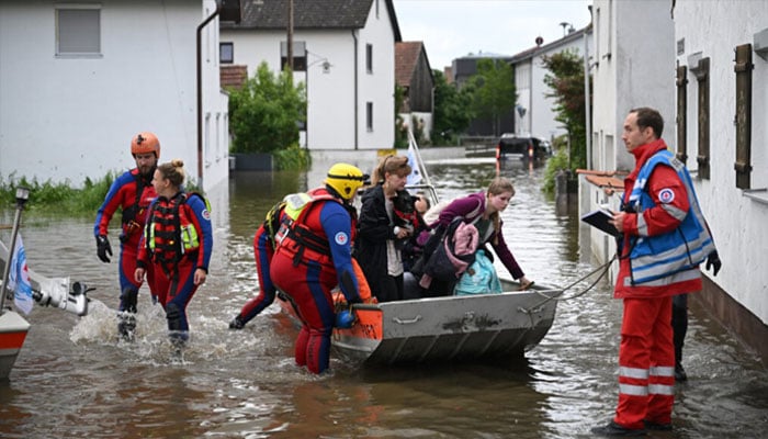 Resuce workers seen in action in this undated image.— AFP/file