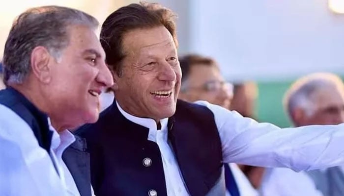 PTI founder Imran Khan (right) poses for a picture with partys Vice Chairman Shah Mahmood Qureshi. — X@PTIofficial/File