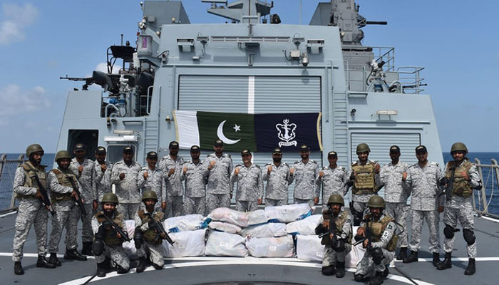 Navy personnel pose for a group photo after a seizure of drugs in an operation in North Arabian Sea in this handout photograph released by Director General Public Relations Pakistan Navy. — Pakistan Navy/File