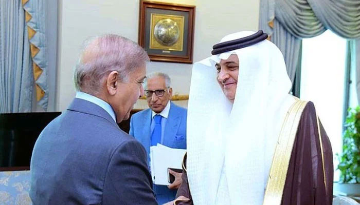 Nawaf bin Saeed Ahmad Al-Malkiy, Ambassador of the Kingdom of Saudi Arabia shaking hands with Prime Minister Muhammad Shehbaz Sharif. — APP/File