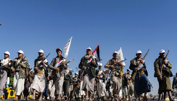 Newly recruited fighters who joined a Houthi military force march during a parade in Sanaa, Yemen December 2, 2023. — Reuters