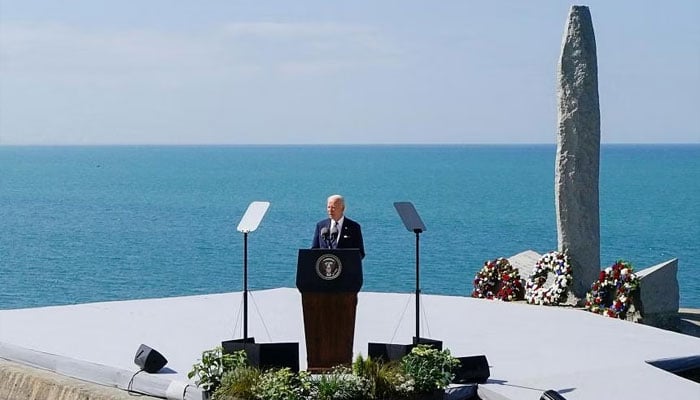 US President Joe Biden delivering his speech at the World War II Pointe du Hoc Ranger Monument, in Normandy, France, on June 7. — Reuters