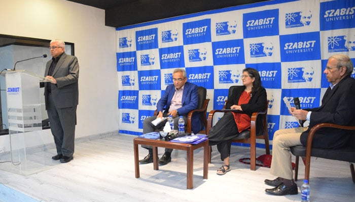 This image shows a speaker addressing the audience during a panel discussion on the topic of From Poverty to Progress: Navigating Economic Challenges at Szabist in Karachi on November 8, 2023. — Facebook/SZABIST