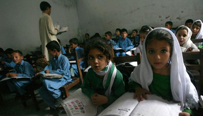A representational image showing school students attending a class in Khyber Pakhtunkhwas Buner district. — Reuters/File