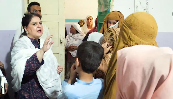 Chairperson Benazir Income Support Programme (BISP), Rubina Khalid speaks with women during her visit to the BISP Payment Campsite at Dhoke Kashmirian on June 8, 2024. — Screengrab via Facebook/BISP Pakistan