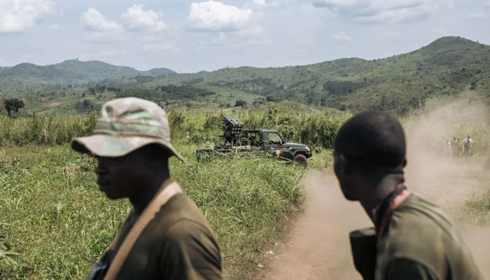 A FARDC (Armed Forces of the DRC) vehicle in a military position in Mirangi, is seen close to the frontline and the town of Kibirizi, controlled by the M23 rebellion, North Kivu province, eastern DRC.  — AFP/File