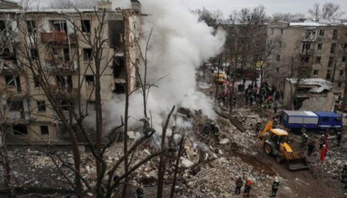 Rescuers work at a site of a residential building heavily damaged during a Russian missile attack in Kharkiv, Ukraine January 23, 2024. — Reuters