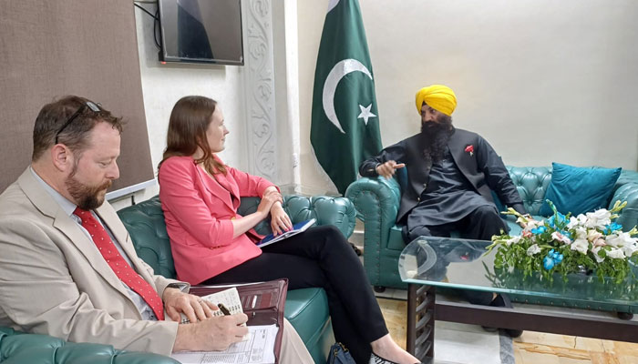 Punjab Minister for Minority Affairs Ramesh Singh Arora (right) meets Consul General of USA Kristen Hawkins (centre) in Lahore in this image released on June 8, 2024. — Facebook/Human Rights and Minorities Affairs Department, Government of the Punjab