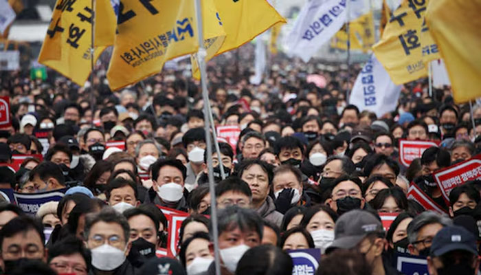 Doctors take part in a rally to protest against government plans to increase medical school admissions in Seoul, South Korea, March 3, 2024. — Reuters