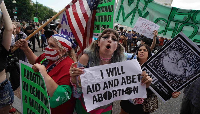 A representational image showing pro-choice and anti-abortion demonstrators gather outside the US Supreme Court in Washington, DC. — AFP/File