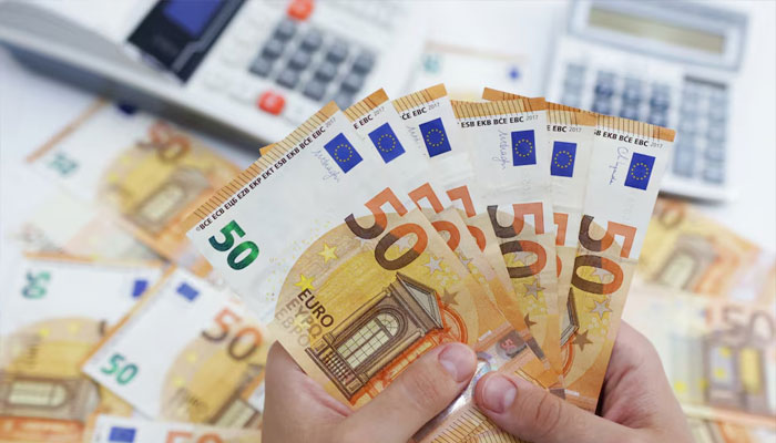 A woman holds Euro banknotes in this illustration taken May 30, 2022. — Reuters