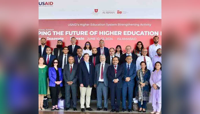 US Chargé dAffaires Andrew J. Schofer (fourth left) and HEC Chairman Dr Mukhtar Ahmed (centre) pose for a group photo along with others during the three-day International Summit on Higher Education on June 10, 2024. — Facebook/U.S. Embassy Pakistan