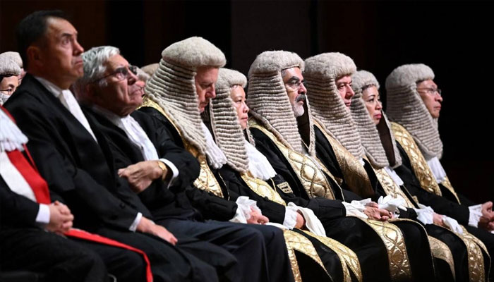 Judges wearing robes and horsehair wigs attend a ceremony held to mark the opening of the legal year in Hong Kong on January 22, 2024. — AFP