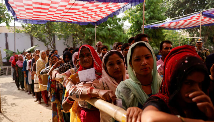 People queue to vote at a polling station during the third phase of the general election, in Sambhal district, in the northern Indian state of Uttar Pradesh, India, May 7, 2024. — Reuters