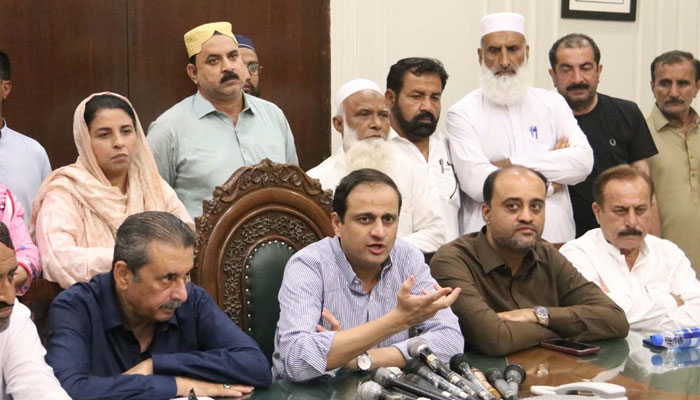 Mayor Karachi Barrister Murtaza Wahab (C) along with Deputy Mayor Salman Abdullah Murad (C to R) speaks during a press conference after the City Council meeting on June 11, 2024. — Facebook/Karachi Metropolitan Corporation