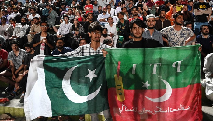 Pakistan cricket supporters watch a live telecast screening the 2024 ICC men´s T20 World Cup group A cricket match between Pakistan and India in New York, at the Rawalpindi Cricket Stadium in Rawalpindi on June 9, 2024. — AFP