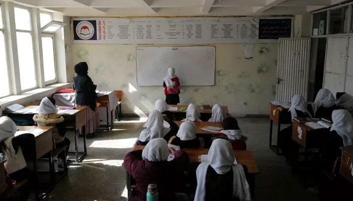 A 4th grade primary school student attends a class in Kabul, Afghanistan, October 26, 2021. — REUTERS