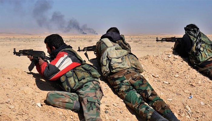 Syrian soldiers fighting ISIS in eastern Syria. — AFP/file