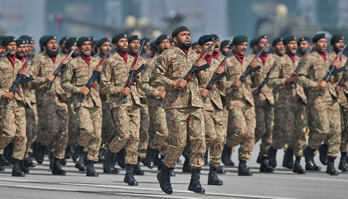 Pakistan Army soldiers march during a military parade to mark Pakistan Day in Islamabad. — AFP/File