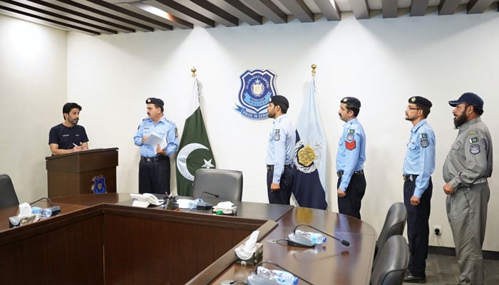 DIG (Headquarters) Dr Syed Mustafa Tanweer speaks to personnel during an orderly room at Central Police Office Islamabad on June 13, 2024. — Facebook/Islamabad Police