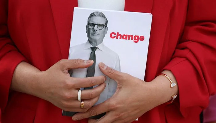 A person holds manifesto of Keir Starmer’s Labour Party. — Reuters file