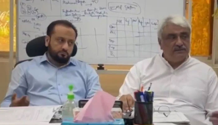 In this still, Provincial Health Ministers Khawaja Salman Rafique (R) and Khawaja Imran Nazir (L) gestures during a meeting at the Project Management Unit (PMU) on June 15, 2024. — Fcaebook/Khawaja Salman Rafique