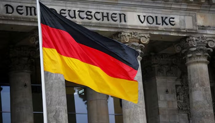 The German flag is seen outside Germanys Bundestag, the lower house of parliament. in Berlin, Germany. — Reuters/File