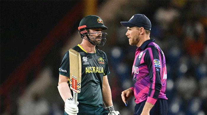 Australia sink brave Scotland, England advance