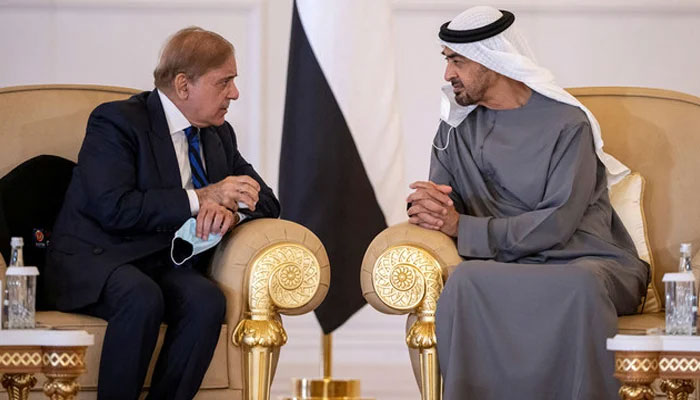 Prime Minister Shehbaz Sharif (left) speaks with United Arab Emirates President Sheikh Mohamed bin Zayed Al Nahyan in this image. — UAE Ministry of Presidential Affairs/File