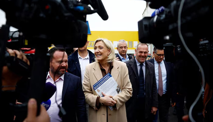 French far-right leader and French far-right National Rally Marine Le Pen party candidate in the upcoming parliamentary elections at a market in Henin-Beaumont, northern France, June 14, 2024. — Reuters