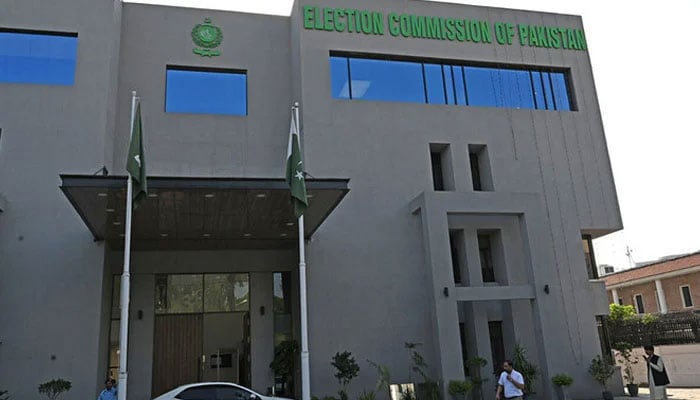 A security personnel stands guard at the headquarters of the Election Commission of Pakistan in Islamabad. — AFP/File