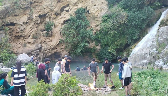 The image released on May 12, 2024 shows people rejoicing at the Hazara Waterfalls in Jab Valley in Haripur. — Facebook/hazarawaterfalls