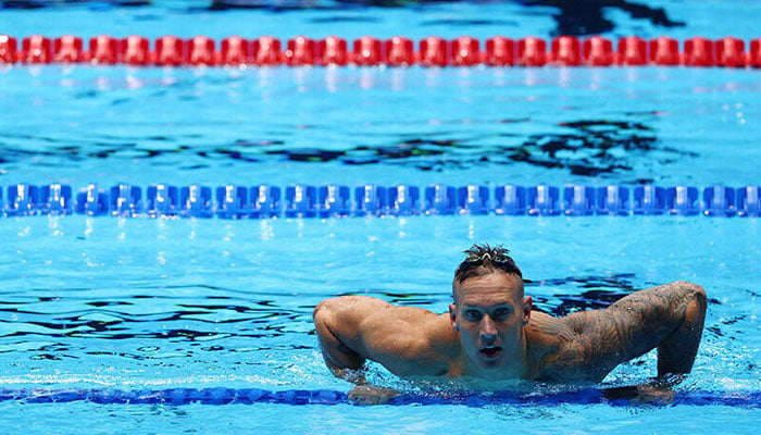 Caeleb Dressel of the United States looks on after the Men’s 100m butterfly semifinal on Day Seven of the 2024 US Olympic Team Swimming Trials at Lucas Oil Stadium on June 21, 2024 in Indianapolis, Indiana. — AFP