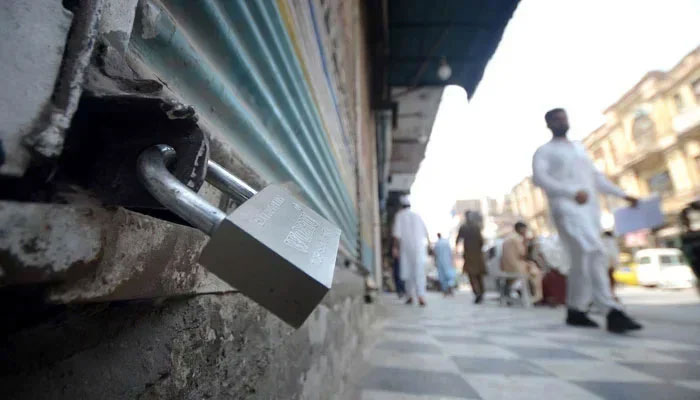 A representational image shows a view of a closed shop. — INP/File