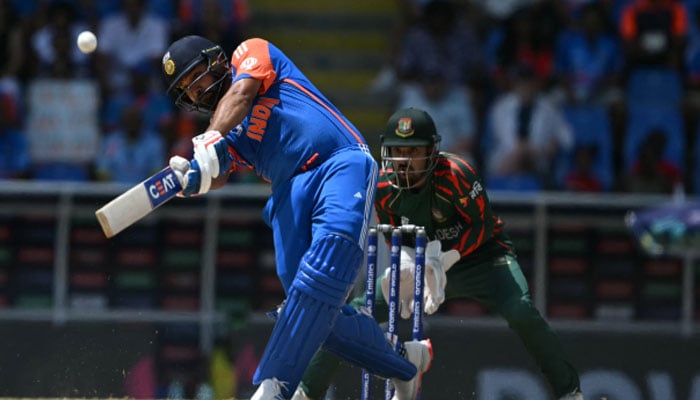 India’s captain Rohit Sharma hits a six during the ICC men’s Twenty20 World Cup 2024 Super Eight cricket match between India and Bangladesh at Sir Vivian Richards Stadium in North Sound, Antigua and Barbuda, on June 22, 2024. — AFP