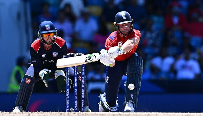 Englands captain and wicketkeeper Jos Buttler hits a shot during the Twenty20 World Cup 2024 Super Eight cricket match, US vs England, Kensington Oval, Bridgetown, June 23, 2024. — AFP