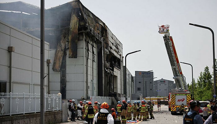 Emergency personnel work at the site of a deadly fire at a lithium battery factory owned by South Korean battery maker Aricell, in Hwaseong, South Korea on June 24, 2024. — Reuters